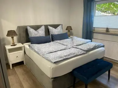 Ein Bett oder Betten in einem Zimmer der Unterkunft Haus Antje