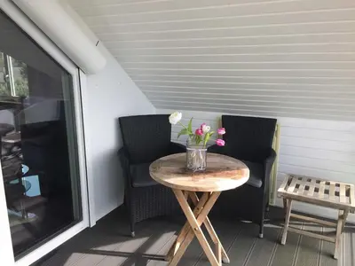 Ein Sitzbereich in der Unterkunft Haus Antje