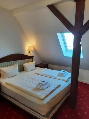 Ein Bett oder Betten in einem Zimmer der Unterkunft Landhaus Bode