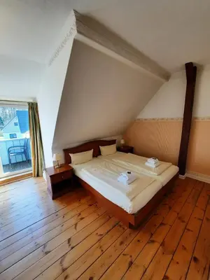 Ein Bett oder Betten in einem Zimmer der Unterkunft Landhaus Bode