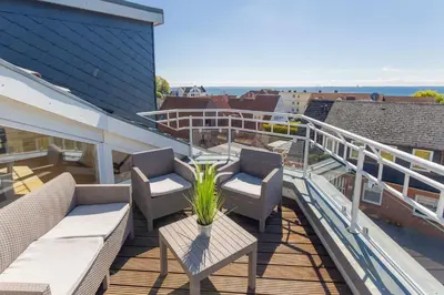 Ein Balkon oder eine Terrasse in der Unterkunft Haus Sonne & Meer