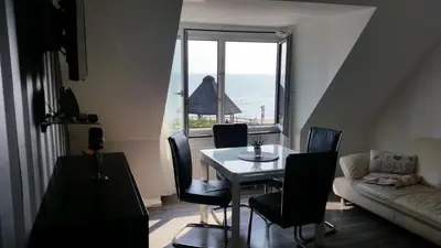 Ein Sitzbereich in der Unterkunft Ferienwohnung Haffkrug Seebrücke