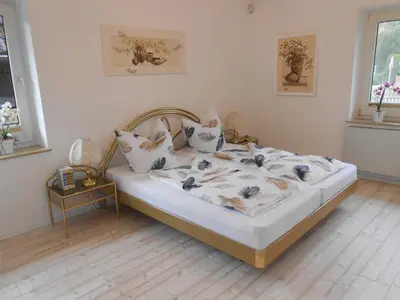 Ein Bett oder Betten in einem Zimmer der Unterkunft Sunhaus Koch