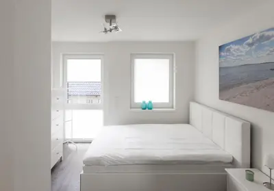 Ein Bett oder Betten in einem Zimmer der Unterkunft Ostseeabenteuer