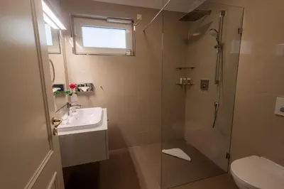 Ein Badezimmer in der Unterkunft Strandhotel Fontana