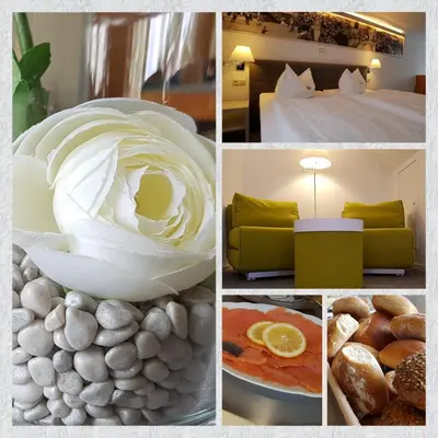 Ein Sitzbereich in der Unterkunft Hotel Residence