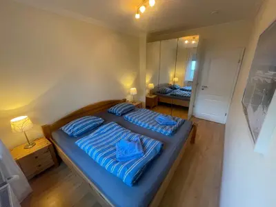 Ein Bett oder Betten in einem Zimmer der Unterkunft 