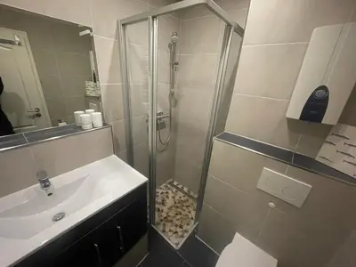Ein Badezimmer in der Unterkunft 