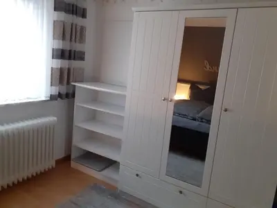 Ein Bett oder Betten in einem Zimmer der Unterkunft Gästehaus Wolf