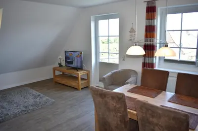 TV/Unterhaltungsangebot in der Unterkunft Am Pool und Strand 8