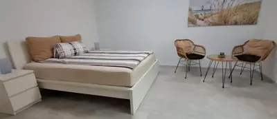 Ein Bett oder Betten in einem Zimmer der Unterkunft Villa Vogelsang VO, Schwimmbad, Sauna