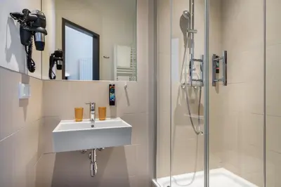 Ein Badezimmer in der Unterkunft Holiday Inn - the niu, Rig Lübeck by IHG