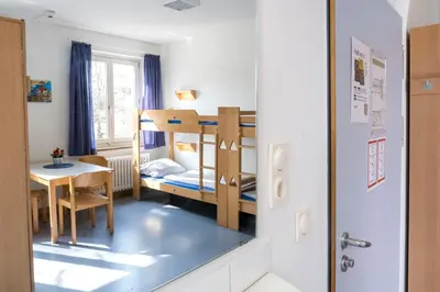 Ein Bett oder Betten in einem Zimmer der Unterkunft Jugendherberge Lübeck Vor dem Burgtor
