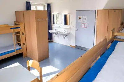 Ein Bett oder Betten in einem Zimmer der Unterkunft Jugendherberge Lübeck Vor dem Burgtor