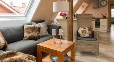 Ein Sitzbereich in der Unterkunft Altes Strandhus Casa Meeresrauschen