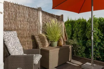 Ein Sitzbereich in der Unterkunft Altes Strandhus Casa Stranddune