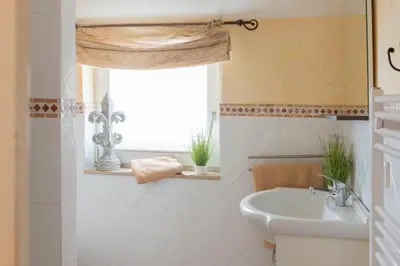 Ein Badezimmer in der Unterkunft Altes Strandhus Casa Stranddune