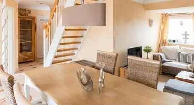 Ein Sitzbereich in der Unterkunft Altes Strandhus Casa Strandmuschel