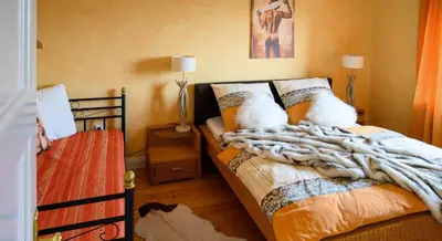 Ein Bett oder Betten in einem Zimmer der Unterkunft Altes Zollhaus Casa Sandstrand