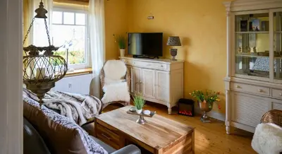 TV/Unterhaltungsangebot in der Unterkunft Altes Zollhaus Casa Sandstrand