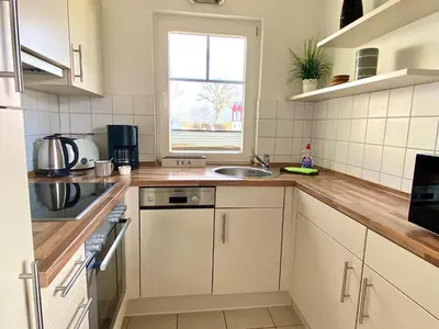 Küche/Küchenzeile in der Unterkunft Hygge - skandinavisch mit Kamin und Sauna