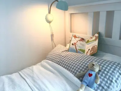 Ein Bett oder Betten in einem Zimmer der Unterkunft Hygge - skandinavisch mit Kamin und Sauna