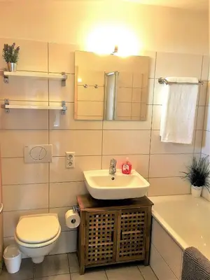 Ein Badezimmer in der Unterkunft Hygge - skandinavisch mit Kamin und Sauna
