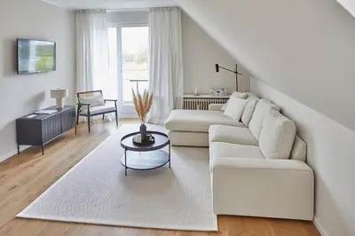 Ein Sitzbereich in der Unterkunft Techts Landhus Birkenallee