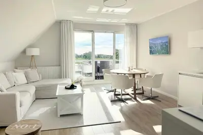 Ein Sitzbereich in der Unterkunft Techts Landhus Birkenallee