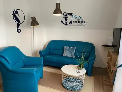 Ein Sitzbereich in der Unterkunft Ferienhaus Edda