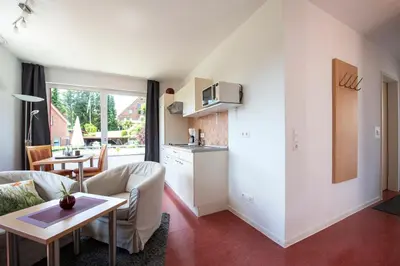 Küche/Küchenzeile in der Unterkunft De Kanalkieker Apartmenthaus Meier