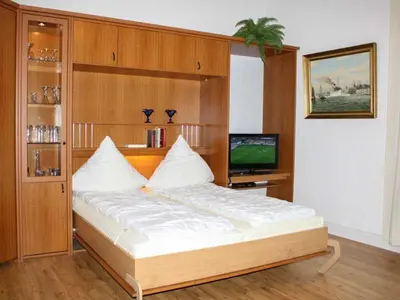 Ein Bett oder Betten in einem Zimmer der Unterkunft Waldhaus Gronenberg