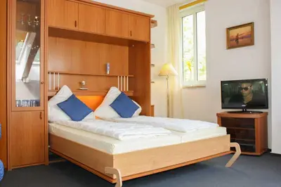 Ein Bett oder Betten in einem Zimmer der Unterkunft Waldhaus Gronenberg