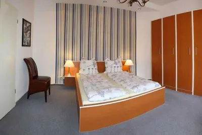Ein Bett oder Betten in einem Zimmer der Unterkunft Waldhaus Gronenberg