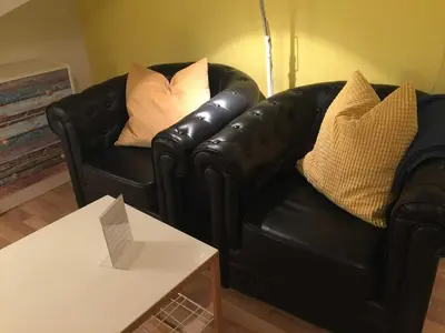 Ein Sitzbereich in der Unterkunft Gästehaus Denecke