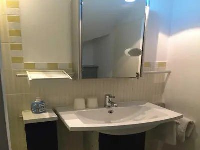 Ein Badezimmer in der Unterkunft Gästehaus Denecke