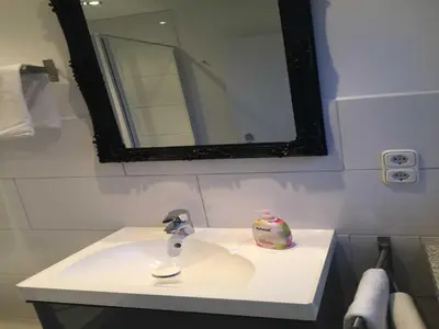 Ein Badezimmer in der Unterkunft Gästehaus Denecke