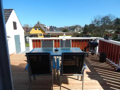 Ein Balkon oder eine Terrasse in der Unterkunft Ferienhaus Königsberg Haus 1