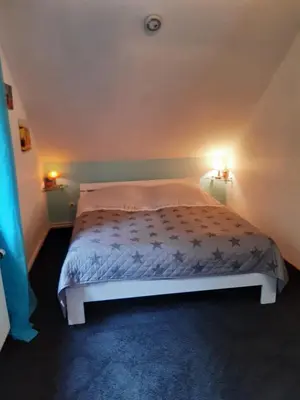 Ein Bett oder Betten in einem Zimmer der Unterkunft Haus Gori