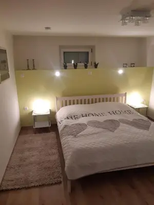 Ein Bett oder Betten in einem Zimmer der Unterkunft Haus Gori