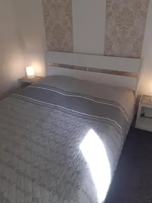 Ein Bett oder Betten in einem Zimmer der Unterkunft Haus Gori