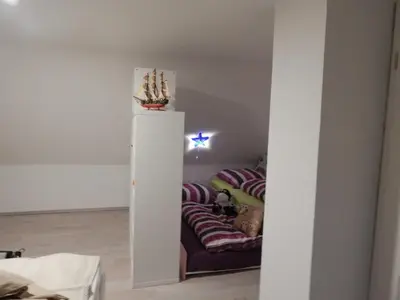 Ein Bett oder Betten in einem Zimmer der Unterkunft Ferienhaus Königsberg Haus 2