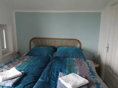 Ein Bett oder Betten in einem Zimmer der Unterkunft Haus Goldbutt - M. Frese