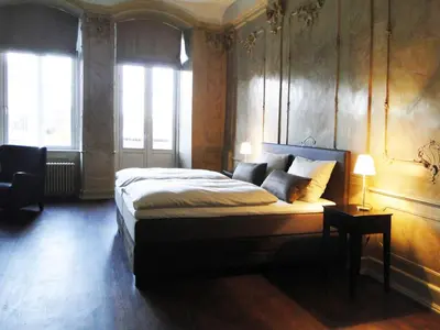 Ein Bett oder Betten in einem Zimmer der Unterkunft Hotel Anno 1216