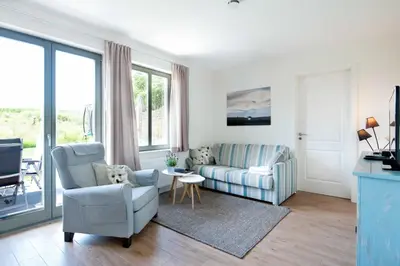 Ein Sitzbereich in der Unterkunft Ferienwohnung Spieß