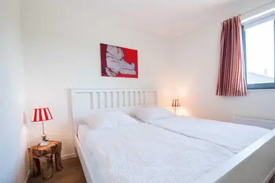 Ein Bett oder Betten in einem Zimmer der Unterkunft Ferienwohnung Spieß