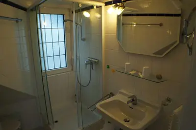 Ein Badezimmer in der Unterkunft Graf Luckner Hüs