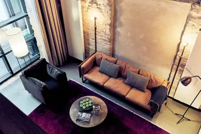 Ein Sitzbereich in der Unterkunft Fisher's Loft Hotel