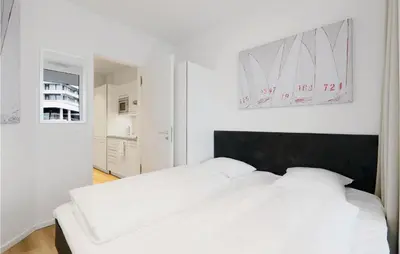 Ein Bett oder Betten in einem Zimmer der Unterkunft Highend Travemünde - Whg 513