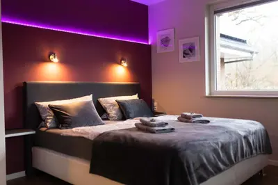 Ein Bett oder Betten in einem Zimmer der Unterkunft Jana's Fewo
